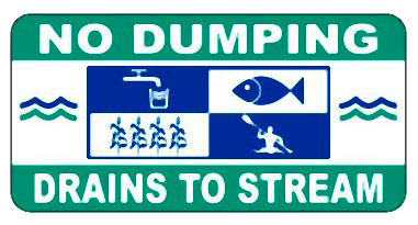 Close-up of a storm drain marker