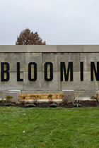 Bloomington's Bicentennial Gateway of limestone blocks and letters spelling "Bloomington"